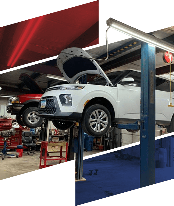 Cars suspended in an auto repair shop